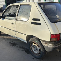 Vehicule-PEUGEOT-205%2520PHASE%25202-1990-1695646164131b2a682929e7a3a9a0b165155b92eb39334115709e406c321880_m.jpg